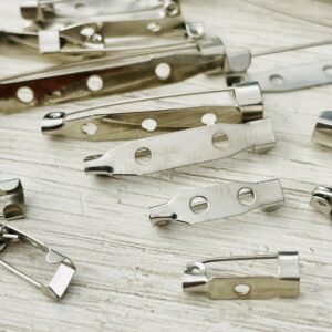 Base de prendedor niquel