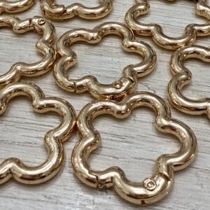 Mosquetón flor Dorado 19812