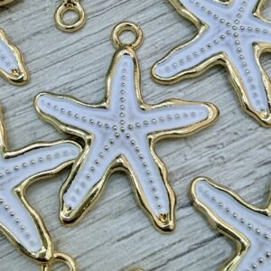 Dije dorado esmaltado opaco estrella de mar  blanco G